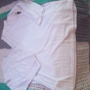 White long sleeve blouse with a fringed/ lace neck line